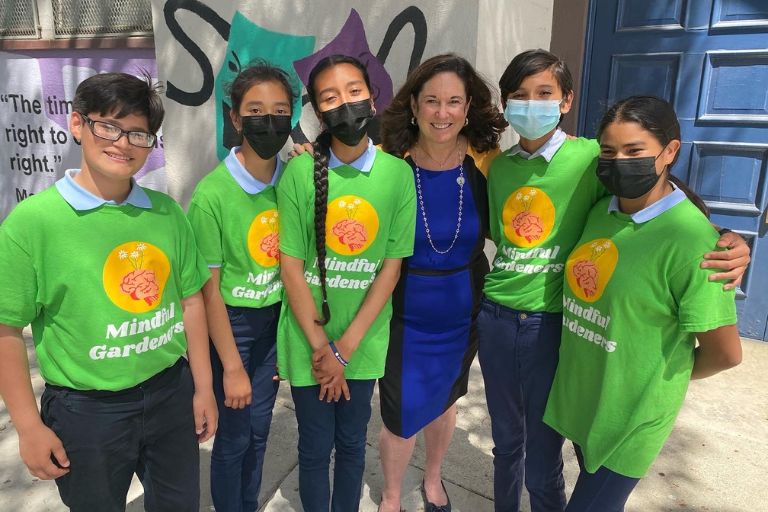U.S. Deputy Secretary of Education Cindy Marten with five middle school student leaders of the Griffith Mindful Gardeners