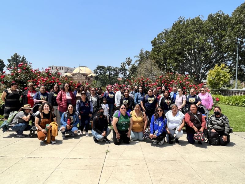 30 parents from East LA community schools in front of the Natural History Museum during a field trip